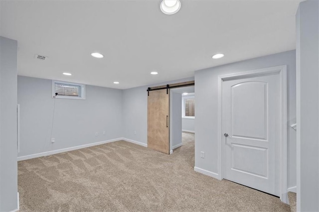 8815 W 81st St, Overland Park, KS 66204 - basement featuring carpet flooring, a barn door, and recessed lighting