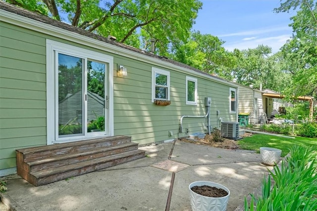 8815 W 81st St, Overland Park, KS 66204 - rear view of property featuring a patio and entry steps