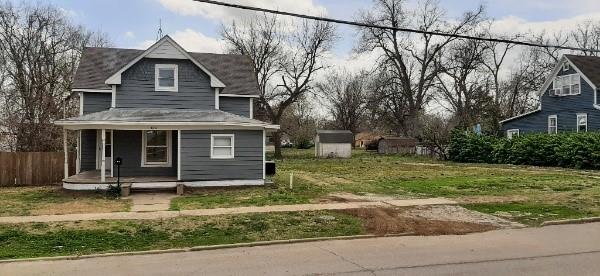 615 Church St, Neodesha, KS 66757 - view of front of home with covered porch