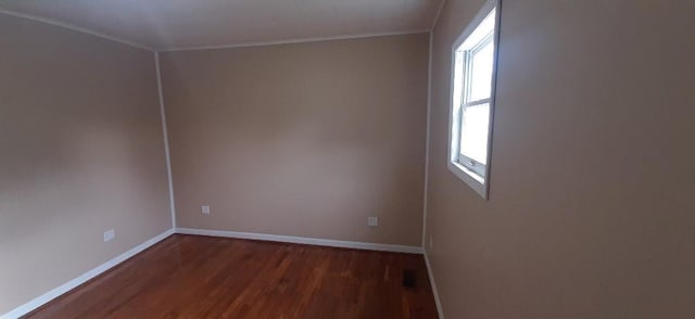 615 Church St, Neodesha, KS 66757 - spare room with wood finished floors and crown molding