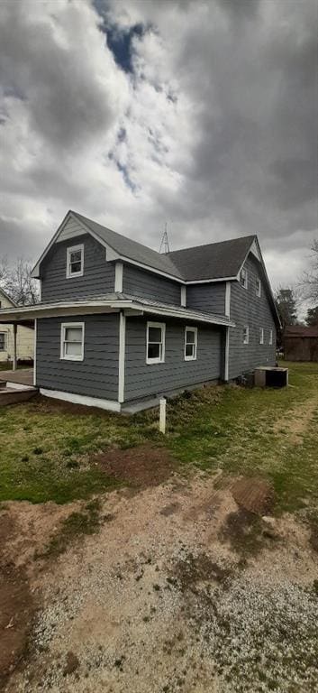 615 Church St, Neodesha, KS 66757 - view of property exterior with a central air condition unit