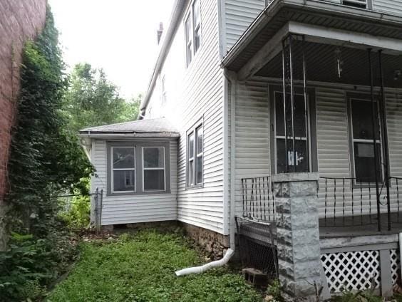 426 Pottawatomie St, Leavenworth, KS 66048 - view of property exterior with covered porch
