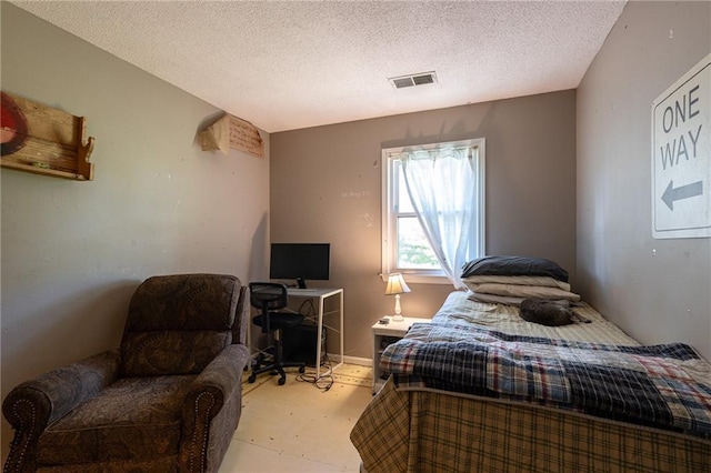 25421 Marel Rd, Excelsior Springs, MO 64024 - bedroom with a textured ceiling and a desk