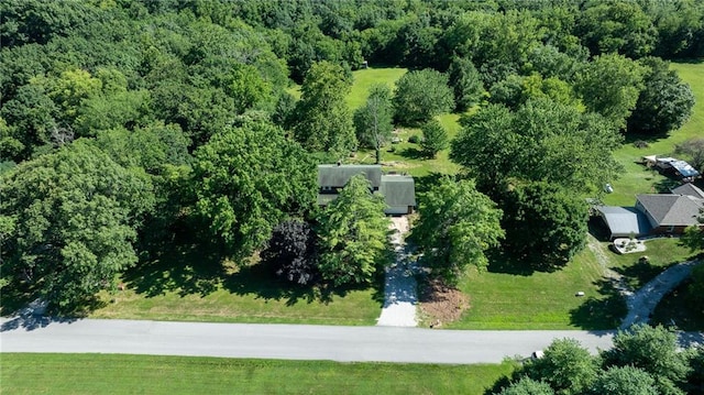 25421 Marel Rd, Excelsior Springs, MO 64024 - aerial view of a heavily wooded area