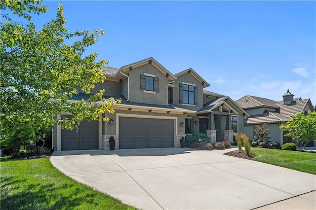 16420 Lucille St, Overland Park, KS 66221 - craftsman-style house with stucco siding, concrete driveway, a front yard, an attached garage, and stone siding
