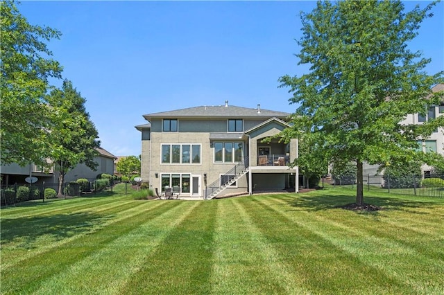 16420 Lucille St, Overland Park, KS 66221 - back of house featuring stairs, a fenced backyard, and stucco siding