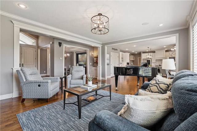 16420 Lucille St, Overland Park, KS 66221 - living room featuring a chandelier, wood finished floors, crown molding, and recessed lighting