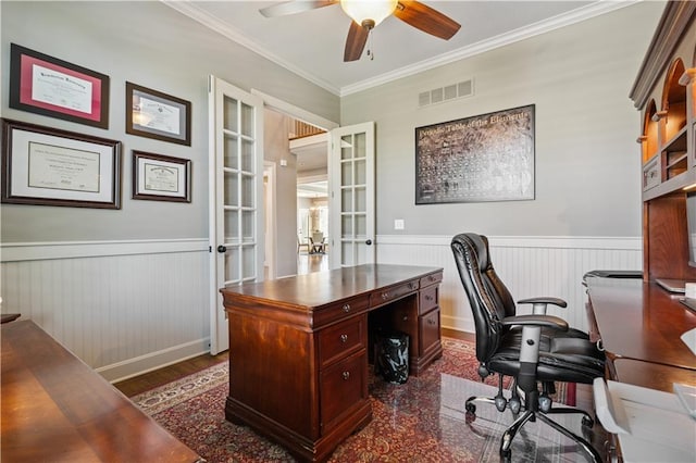 16420 Lucille St, Overland Park, KS 66221 - office area featuring a wainscoted wall, ceiling fan, crown molding, dark wood-style floors, and french doors