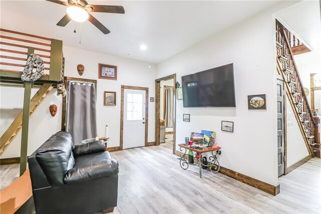 600 W Chestnut St, Holden, MO 64040 - living room featuring stairs, light wood-style floors, ceiling fan, and recessed lighting