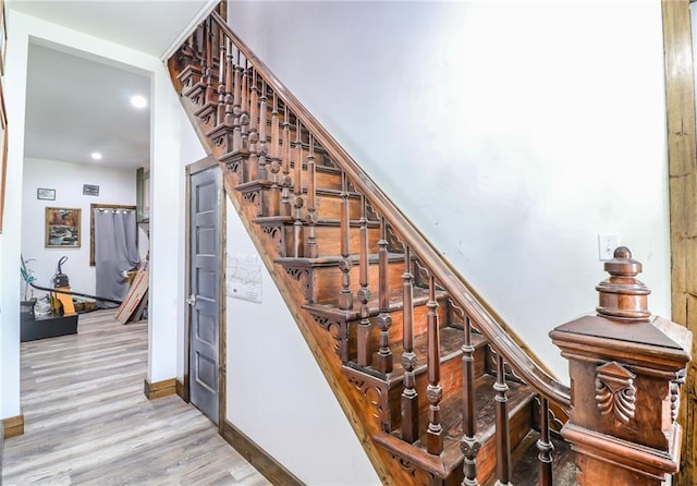 600 W Chestnut St, Holden, MO 64040 - stairs featuring wood finished floors and recessed lighting