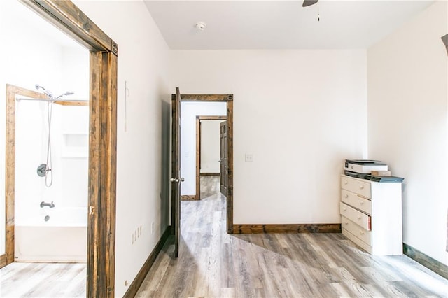 600 W Chestnut St, Holden, MO 64040 - unfurnished bedroom with light wood-type flooring