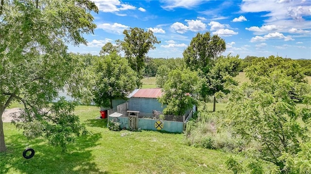600 W Chestnut St, Holden, MO 64040 - view of grassy yard with an outbuilding