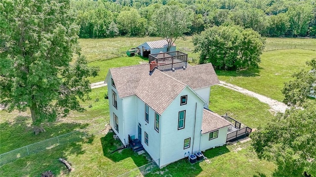 600 W Chestnut St, Holden, MO 64040 - aerial view of property and surrounding area featuring a forest