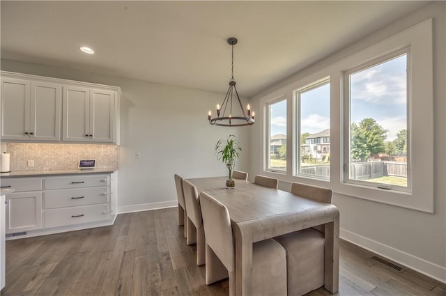 24976 W 87th St, Lenexa, KS 66227 - dining room with a chandelier, dark wood-style floors, and recessed lighting