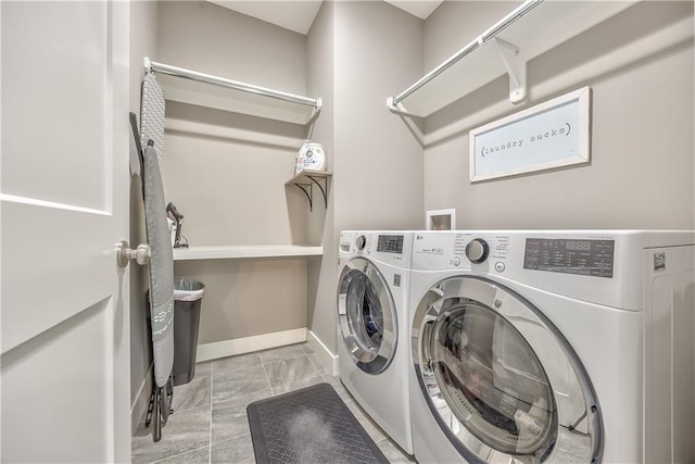 24976 W 87th St, Lenexa, KS 66227 - washroom featuring washer and clothes dryer and marble look tile flooring