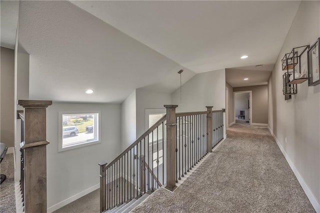 24976 W 87th St, Lenexa, KS 66227 - corridor featuring carpet flooring, lofted ceiling, an upstairs landing, and recessed lighting