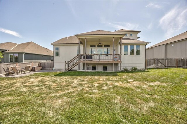 24976 W 87th St, Lenexa, KS 66227 - rear view of property featuring ceiling fan, stairs, a fenced backyard, and a patio