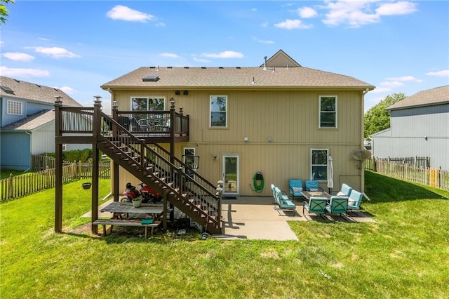 8103 NE 111th Ter, Kansas City, MO 64157 - rear view of house with a wooden deck, stairway, a patio area, a fenced backyard, and an outdoor living space