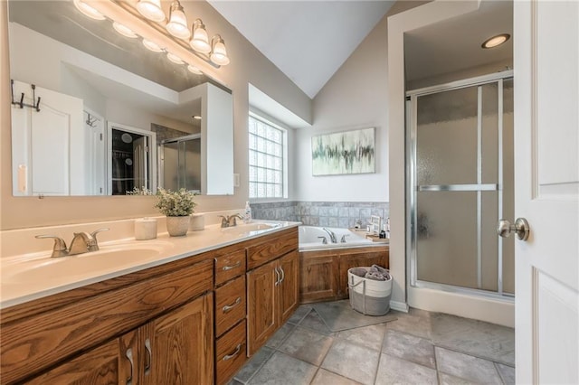 8103 NE 111th Ter, Kansas City, MO 64157 - full bath with a shower stall, lofted ceiling, double vanity, a bath, and a spacious closet