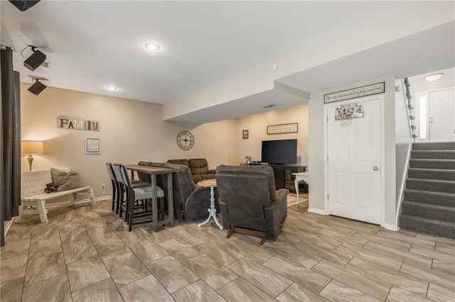 8103 NE 111th Ter, Kansas City, MO 64157 - living room with stairs and recessed lighting