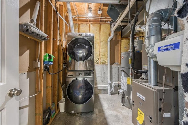 8103 NE 111th Ter, Kansas City, MO 64157 - washroom with stacked washer / dryer and water heater