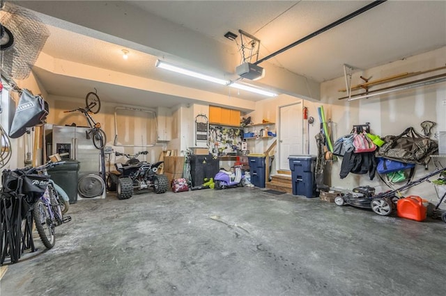 8103 NE 111th Ter, Kansas City, MO 64157 - garage with a garage door opener