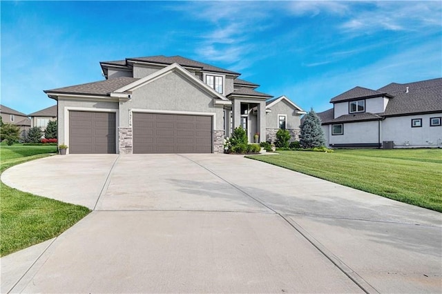 15716 Canterbury St, Overland Park, KS 66085 - view of front of property featuring an attached garage, stucco siding, driveway, a front yard, and stone siding