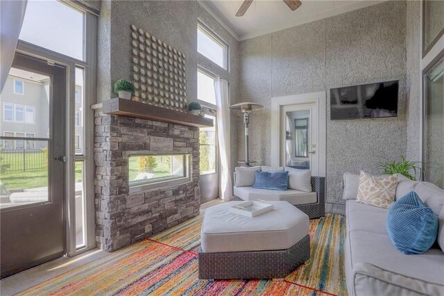 15716 Canterbury St, Overland Park, KS 66085 - living area featuring a high ceiling and a ceiling fan