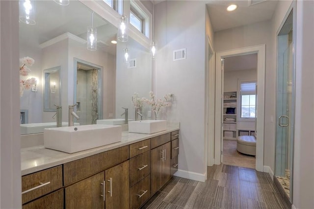 15716 Canterbury St, Overland Park, KS 66085 - full bathroom featuring double vanity and a stall shower