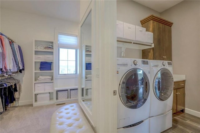 15716 Canterbury St, Overland Park, KS 66085 - laundry room featuring independent washer and dryer and cabinet space