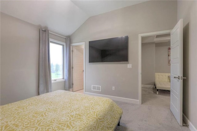 15716 Canterbury St, Overland Park, KS 66085 - bedroom with lofted ceiling and light carpet