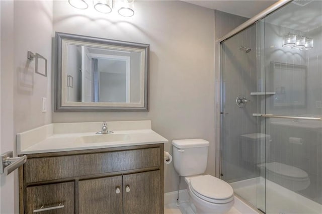 15716 Canterbury St, Overland Park, KS 66085 - bathroom featuring vanity and a shower stall