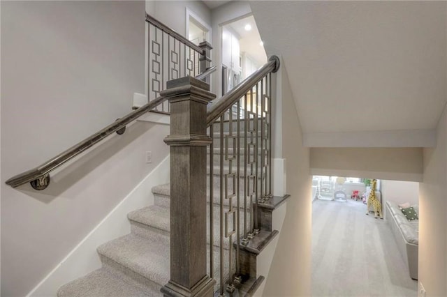 15716 Canterbury St, Overland Park, KS 66085 - stairs featuring a towering ceiling and wood finished floors