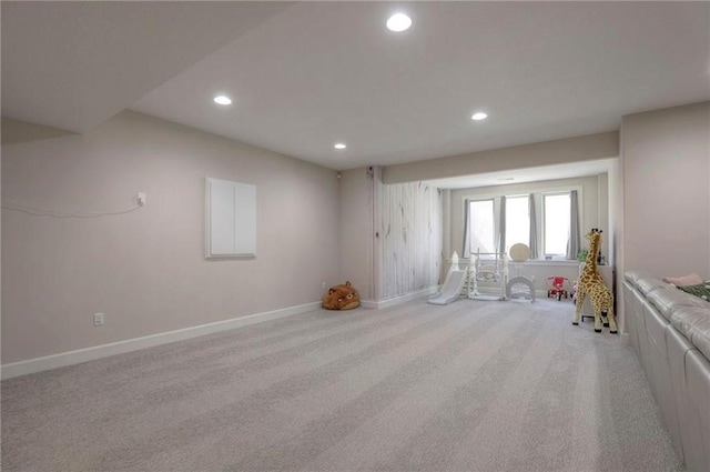 15716 Canterbury St, Overland Park, KS 66085 - unfurnished living room featuring recessed lighting and carpet floors