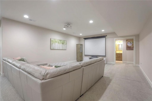 15716 Canterbury St, Overland Park, KS 66085 - home theater room featuring light carpet and recessed lighting