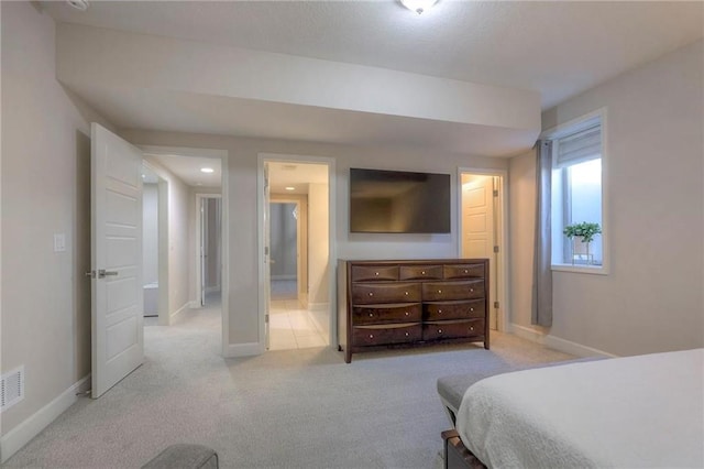 15716 Canterbury St, Overland Park, KS 66085 - carpeted bedroom with baseboards and ensuite bathroom