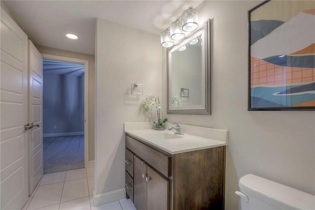 15716 Canterbury St, Overland Park, KS 66085 - bathroom featuring vanity, tile patterned flooring, and recessed lighting