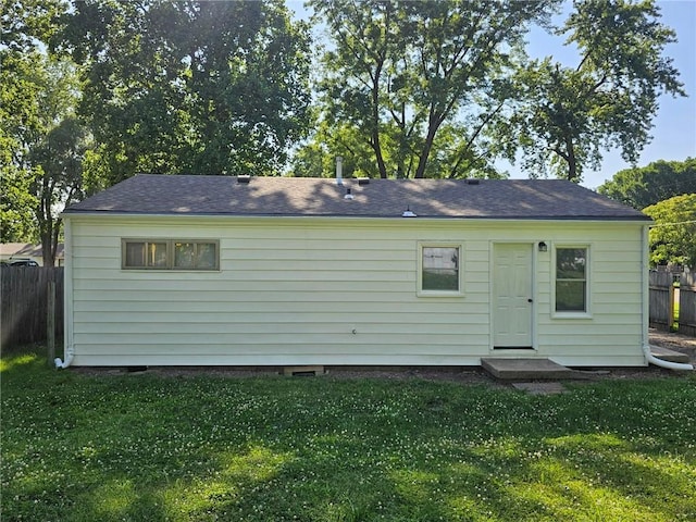 1615 N High St, Independence, MO 64050 - back of property with roof with shingles