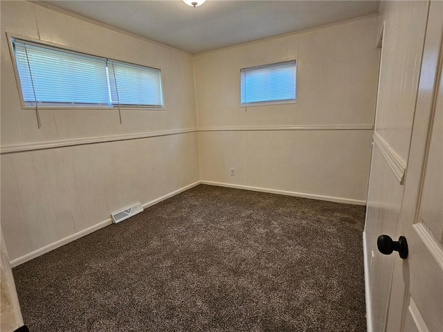 1615 N High St, Independence, MO 64050 - carpeted empty room featuring baseboards