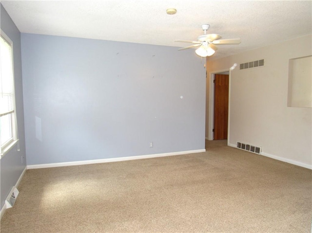 502 N Jefferson St, Spring Hill, KS 66083 - unfurnished room with a ceiling fan and light colored carpet