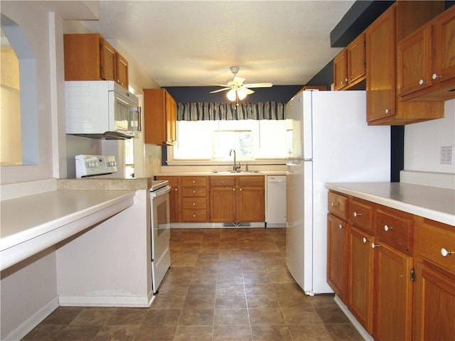 502 N Jefferson St, Spring Hill, KS 66083 - kitchen featuring white appliances, a ceiling fan, and light countertops