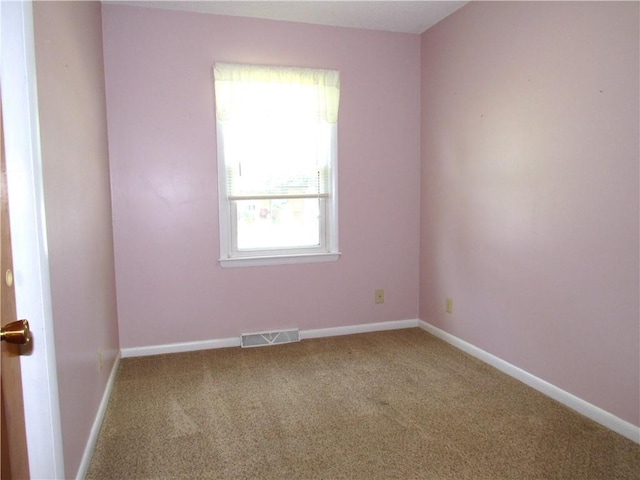 502 N Jefferson St, Spring Hill, KS 66083 - carpeted spare room featuring baseboards
