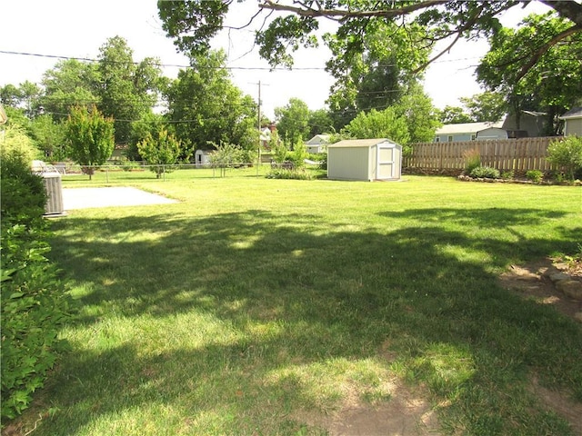 502 N Jefferson St, Spring Hill, KS 66083 - fenced backyard featuring a shed