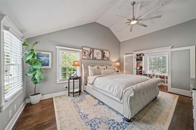 1295 W 71st Ter, Kansas City, MO 64114 - bedroom with lofted ceiling, dark wood-style floors, and a ceiling fan