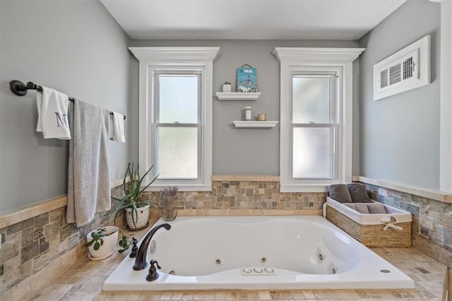 1295 W 71st Ter, Kansas City, MO 64114 - bathroom with a jetted tub