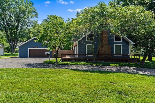 6727 Harvard Ave, Raytown, MO 64133 - view of front of property featuring a front lawn, a garage, a chimney, and a deck