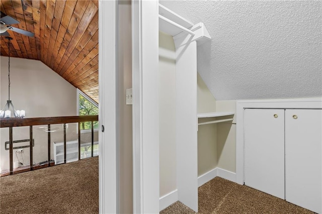 6727 Harvard Ave, Raytown, MO 64133 - walk in closet with lofted ceiling, carpet flooring, and a ceiling fan