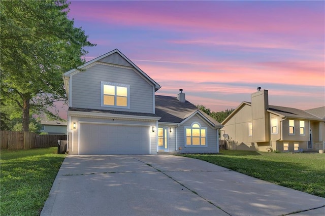 220 NE Dreamweaver Ave, Lees Summit, MO 64086 - traditional home featuring a garage and concrete driveway