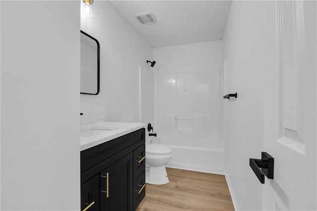 220 NE Dreamweaver Ave, Lees Summit, MO 64086 - full bath with vanity, wood finished floors, and shower / washtub combination