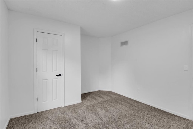 220 NE Dreamweaver Ave, Lees Summit, MO 64086 - spare room featuring carpet floors and baseboards
